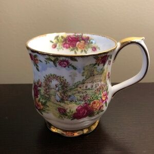 Royal Albert Green and Pink Porcelain Teacup with Floral Design